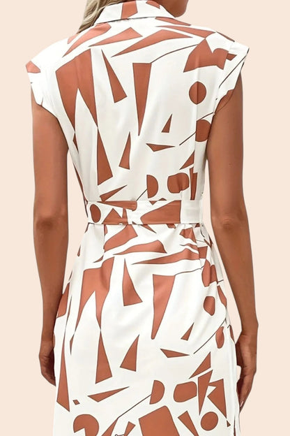 Back view of My Store midi dress featuring a white and brown abstract geometric print, cap sleeves, and a waist tie.