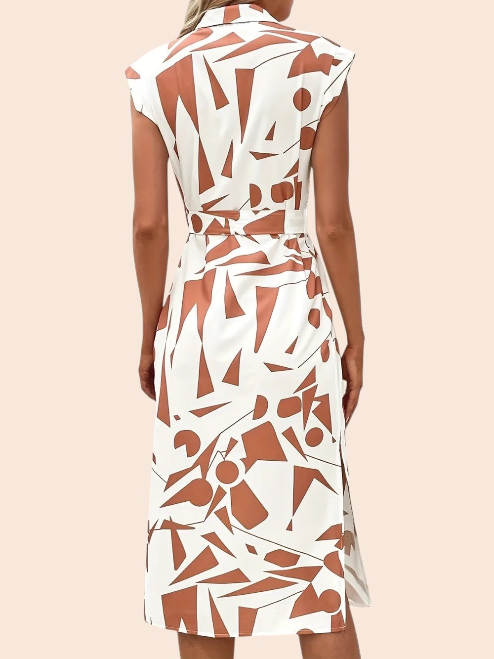 Back view of My Store midi dress featuring a white and brown abstract geometric print, cap sleeves, and a waist tie.