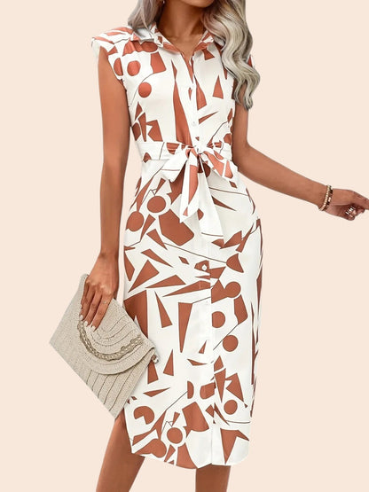 My Store midi dress featuring a white and brown abstract geometric print, cap sleeves, and a removable waist tie.