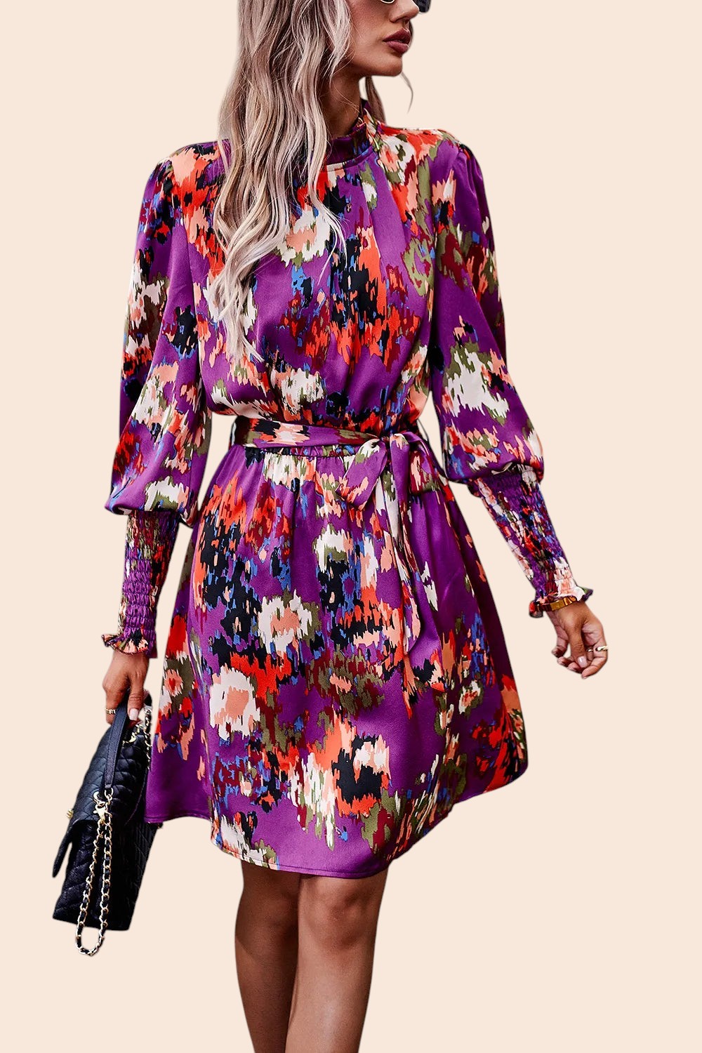 My Store abstract print mini dress with mock neckline, long voluminous sleeves, and removable waist tie on a model