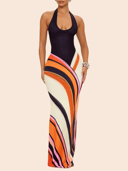 My Store abstract swirl print maxi dress with a black halter bodice and floor-length skirt on a model