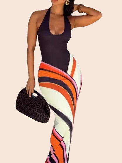 My Store abstract swirl print maxi dress with a black halter bodice and floor-length skirt on a woman
