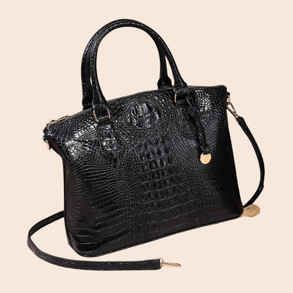My Store Amara black crocodile-embossed top handle handbag with a detachable shoulder strap and gold hardware.