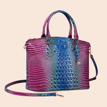 My Store Amara handbag in a vibrant purple and blue crocodile-embossed finish with top handles and shoulder strap.