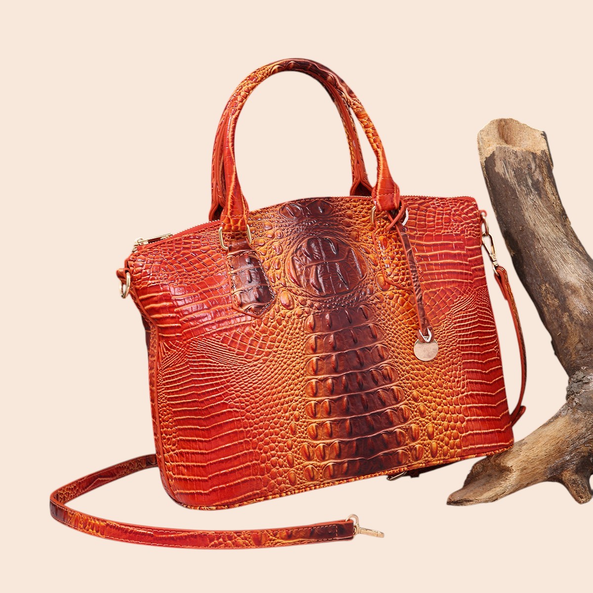 My Store Amara croc-embossed top handle handbag in a vibrant orange and brown gradient with polished hardware.