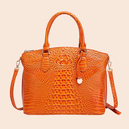 My Store Amara orange crocodile-embossed top handle handbag with a structured silhouette and detachable strap.