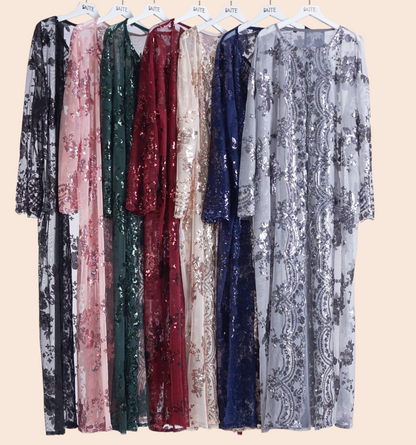 My Store Amira embroidered sequin maxi dresses in various colors hanging on white hangers