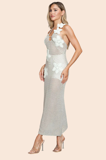 My Store beige crochet maxi dress with halter neckline and white 3D floral appliqués worn by a model