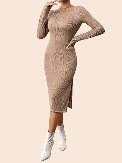 My Store beige textured midi dress with long sleeves, round neckline, and side slit worn by a model with white boots.