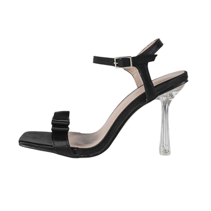 My Store black peep-toe high heels with a bow detail, side cutouts, and a clear stiletto heel with buckle strap.