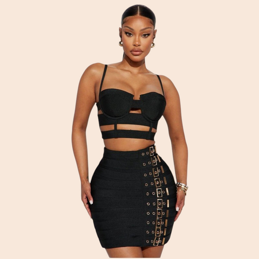 My Store black bodycon mini dress with cutout details, spaghetti straps, and edgy gold buckle accents on the skirt.