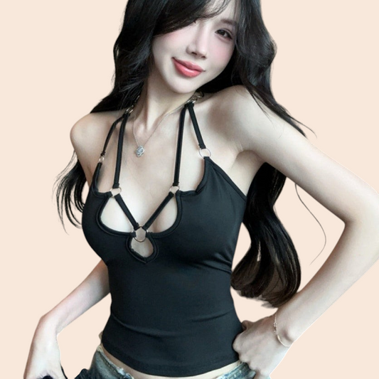 My Store black halter top with metallic ring detail and daring cutout neckline worn by a woman