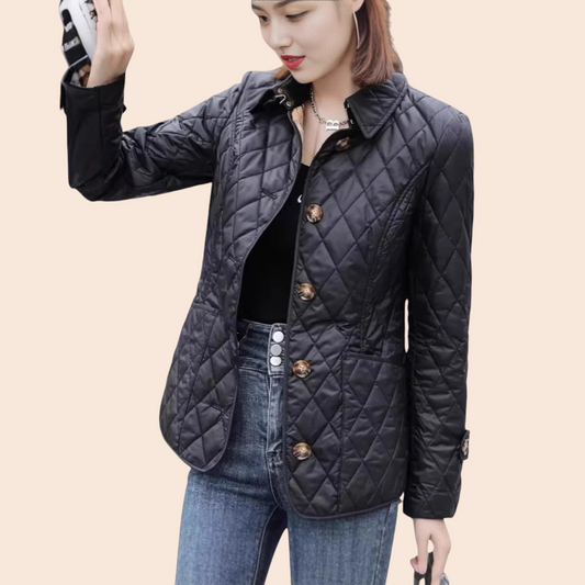 My Store black diamond quilted jacket with a collared neckline and button-front worn by a woman on a city street