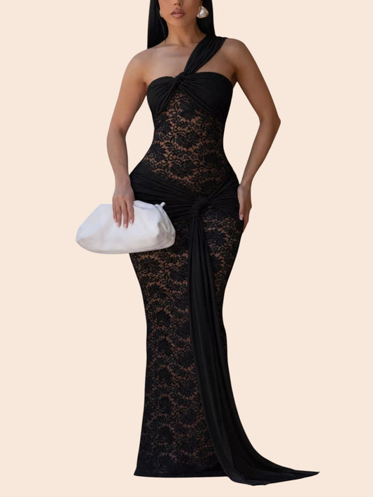 My Store one-shoulder black lace maxi dress with a waist cutout and draped side detail on a model holding a white bag.