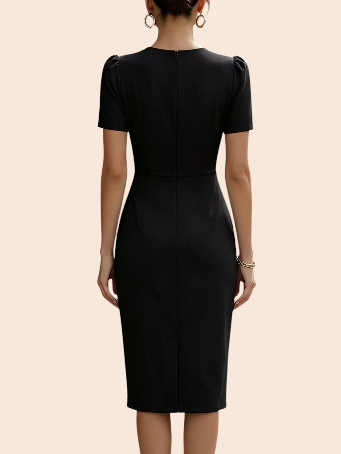 Back view of a My Store black midi dress with short sleeves, pleated waist, and a fitted pencil skirt silhouette.