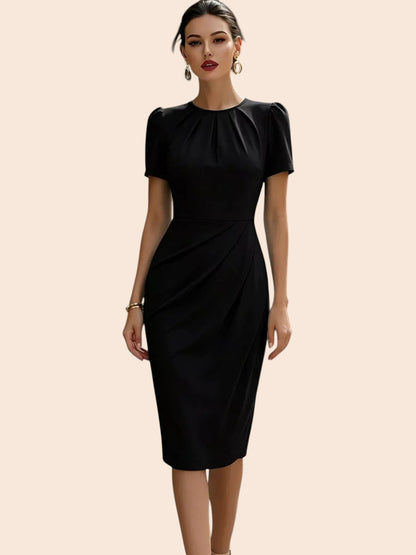 My Store black midi dress with pleated neckline and waist, short sleeves, and a tailored pencil silhouette.