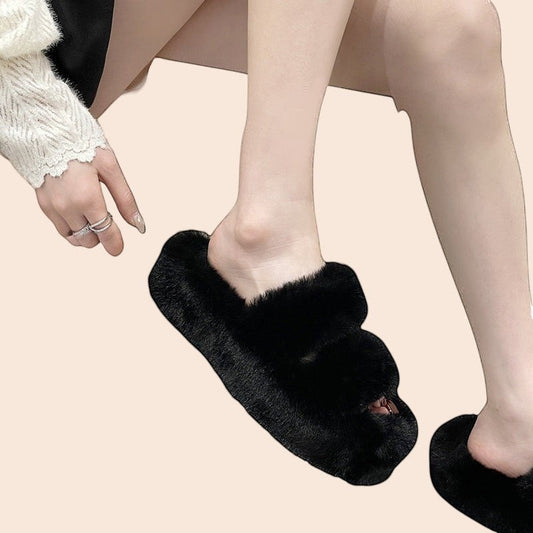 My Store black plush cross-strap platform slippers with an open-toe design worn on a model's feet.