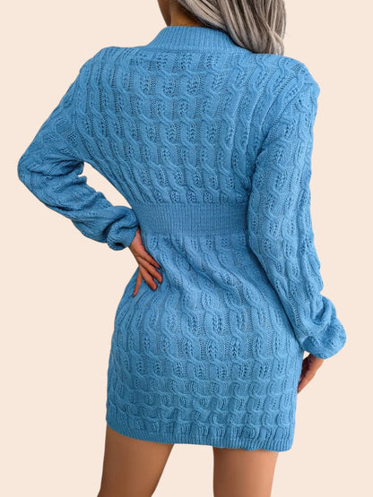 My Store blue cable-knit mini sweater dress with a cinched ribbed waist and voluminous sleeves, back view.