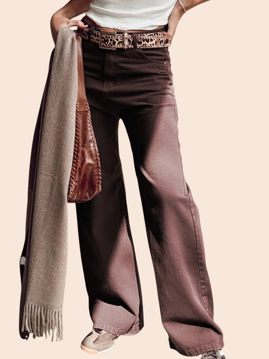 My Store brown wide leg high waist jeans with contrast stitching, styled with a leopard print belt and brown scarf.