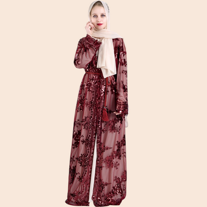 My Store Amira burgundy sheer mesh maxi dress with floral embroidery, sequins, long sleeves, and a braided waist belt.