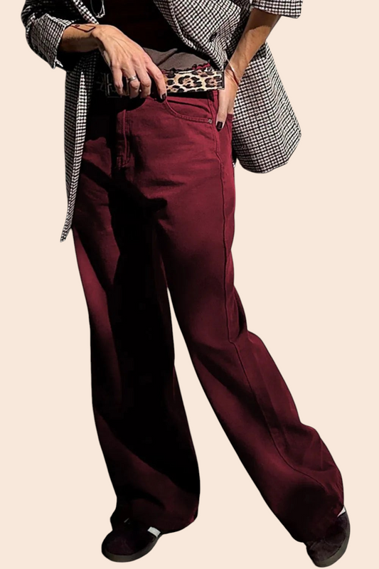 My Store high-waisted wide leg jeans in rich burgundy worn with a houndstooth blazer and leopard print belt