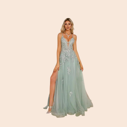 Model wearing My Store Celeste sage green tulle evening gown with floral embroidery, plunging neckline, and thigh slit.