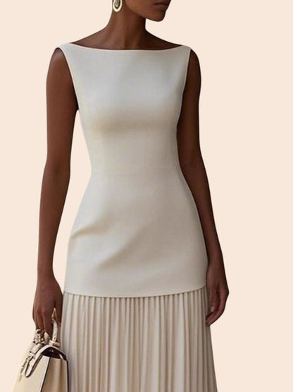 My Store sleeveless cream maxi dress with a bateau neckline, structured bodice, and a flowing drop-waist pleated skirt.