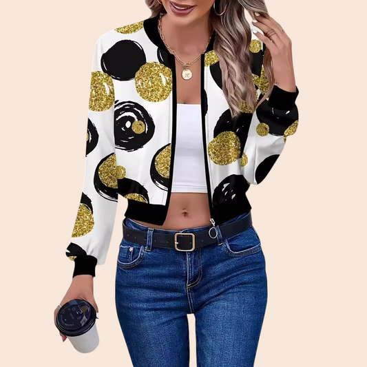 My Store cropped bomber jacket featuring a white, black, and gold glitter polka dot print with a zip-front closure.