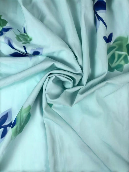 My Store floral print fabric in light blue with green and purple accents, showing a soft draped texture.