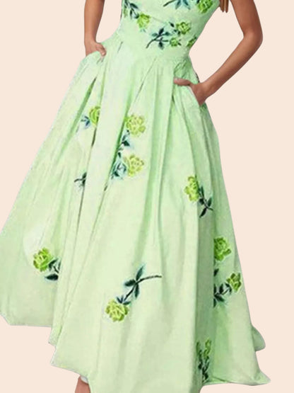 My Store strapless midi dress in light green with a delicate floral print, featuring a fitted bodice and side pockets.