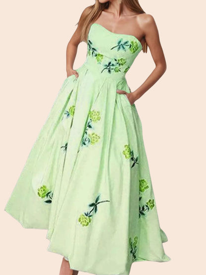 My Store strapless midi dress in light green with a delicate floral print, featuring a fitted bodice and side pockets.