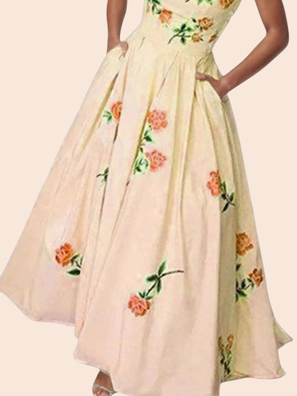 My Store strapless midi dress in cream with orange floral print, featuring a fitted bodice and full A-line skirt.