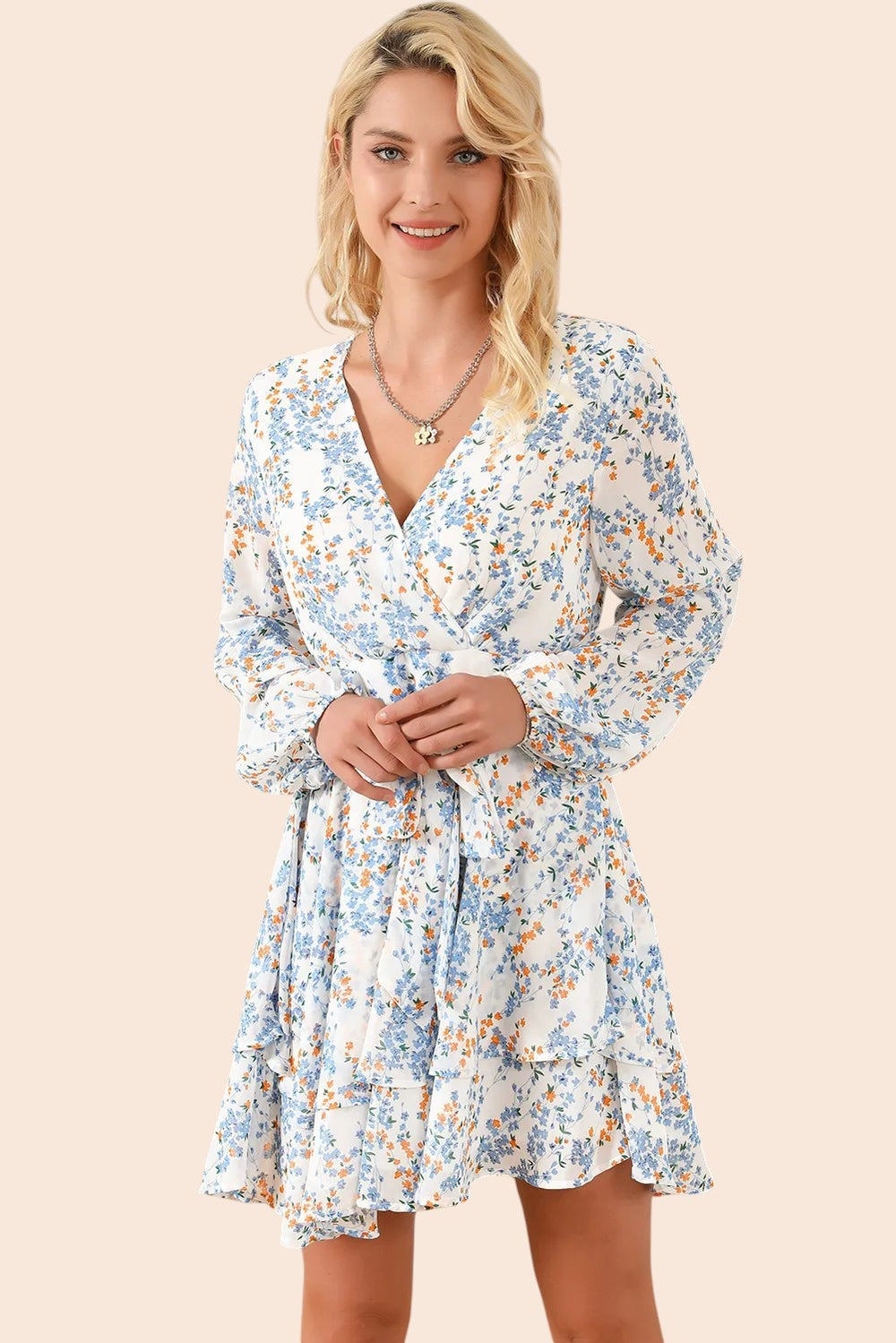 My Store floral surplice mini dress with long balloon sleeves and tiered ruffle skirt on a blonde model