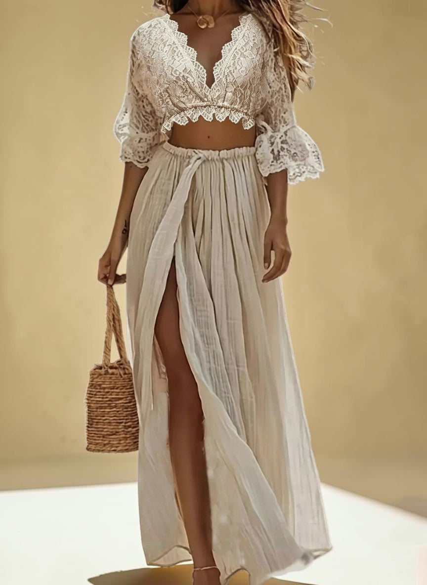 My Store cream lace crop top with V-neck and bell sleeves paired with a high-waisted slit maxi skirt.