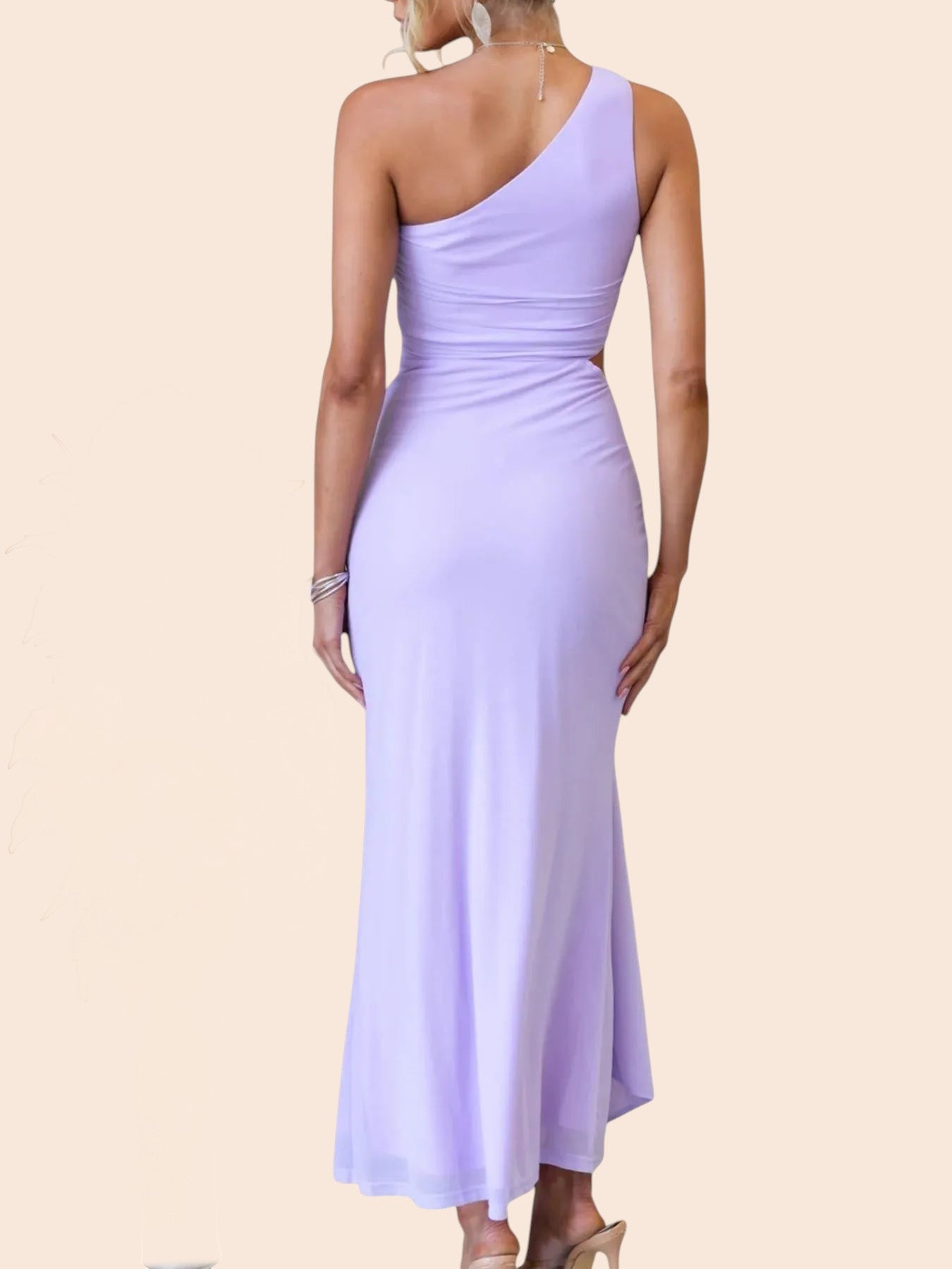 Back view of a My Store lavender one-shoulder maxi dress with a waist cutout and draped ruched detailing.
