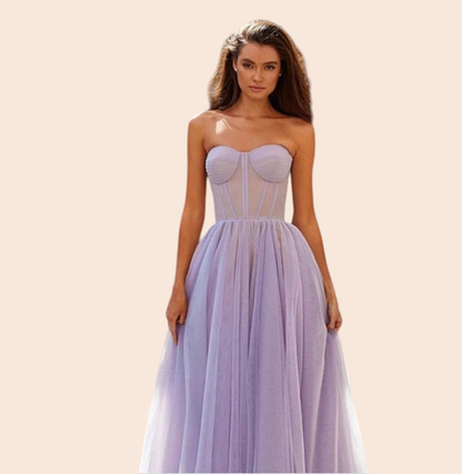 My Store Vivienne corset midi dress in lavender tulle with a strapless sweetheart neckline and voluminous skirt.