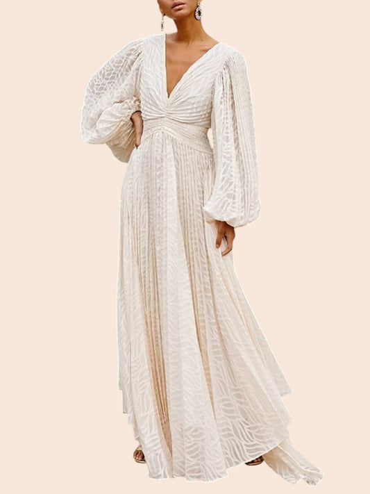 My Store cream maxi dress with leaf texture, V-neckline, and voluminous balloon sleeves in a garden setting