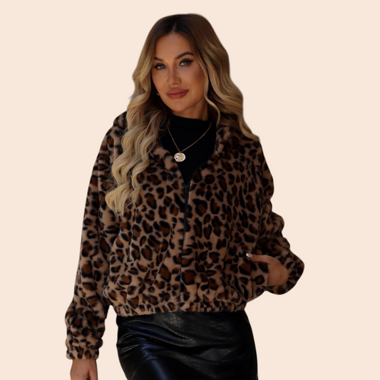 My Store leopard print plush jacket with zip front and relaxed fit worn by a blonde woman against a stone wall