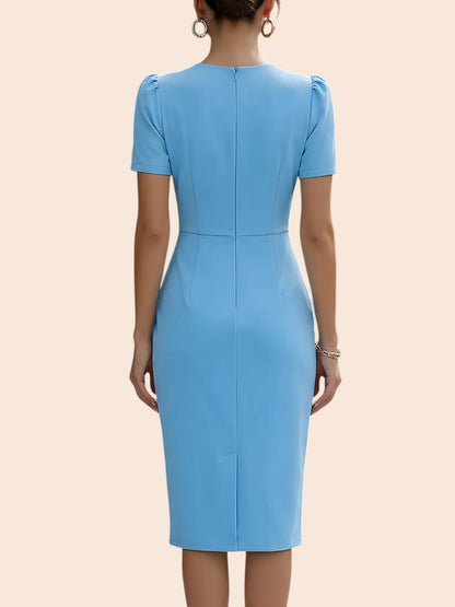 Back view of a My Store light blue midi dress with short sleeves and a tailored pencil skirt silhouette.