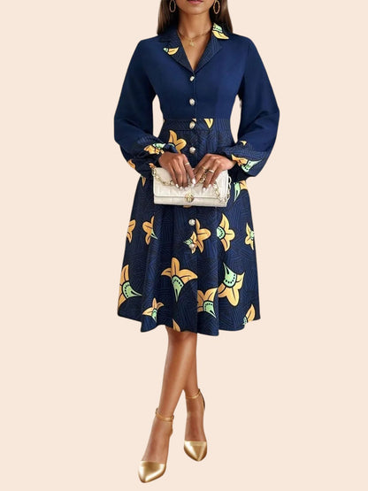 My Store navy blue midi shirt dress with yellow floral print, collared neckline, button-front, and long sleeves.