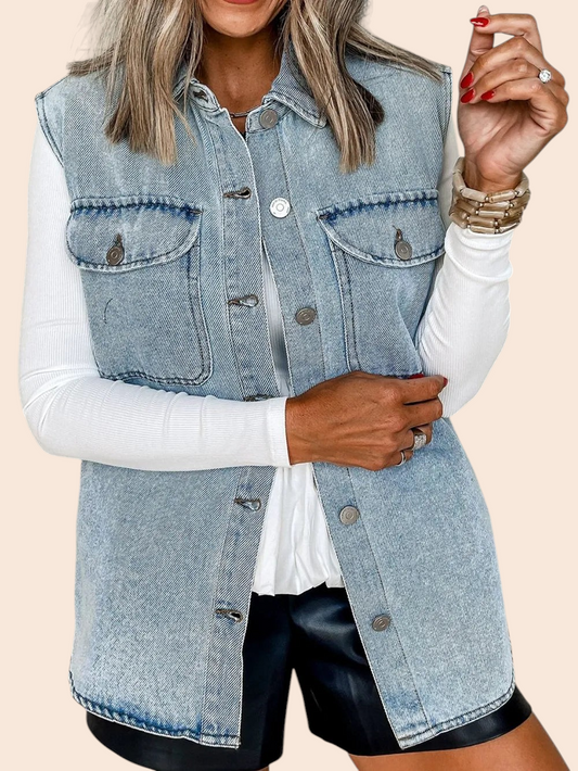 My Store oversized light-wash denim vest with button-front closure and utility pockets worn over a white long-sleeve top