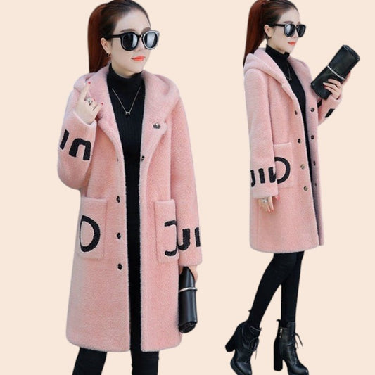 My Store pink hooded mid-length trench coat with black letter print details worn by a woman with sunglasses