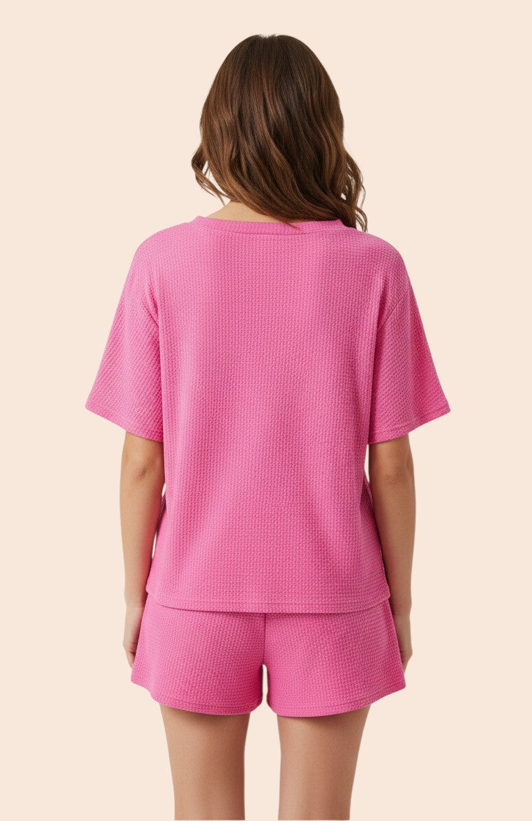 My Store pink waffle-knit round neck top and shorts set with sequin detail. Polyester and viscose blend.