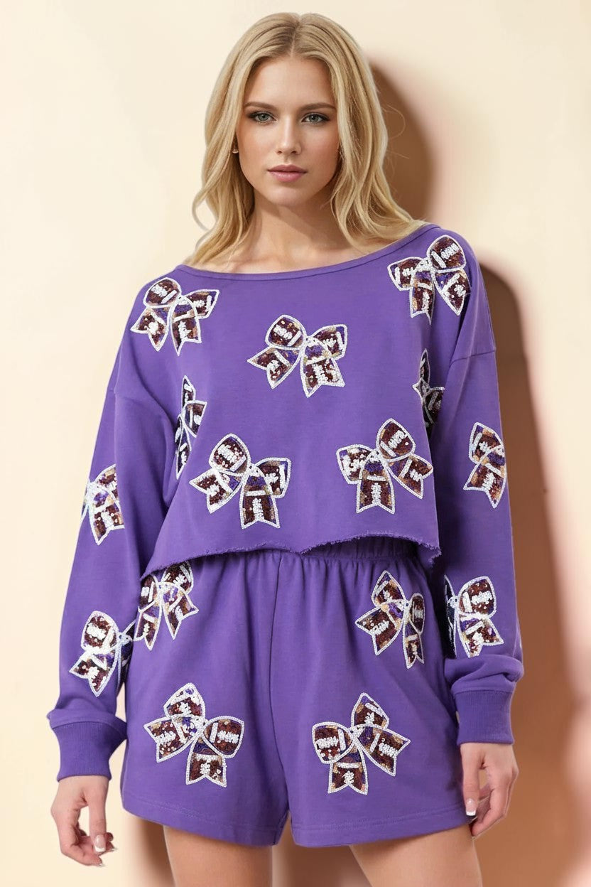 My Store purple long sleeve top and shorts set with sequined bow print. Relaxed fit, crew neck, elastic waist shorts.