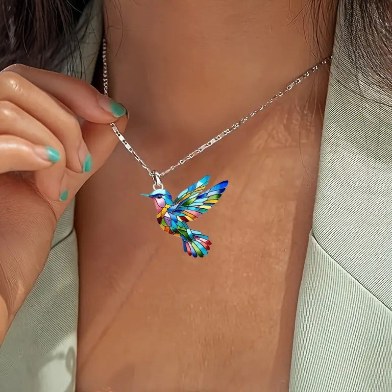 My Store rainbow hummingbird necklace with multicolor wings, delicate chain, and matching earrings.