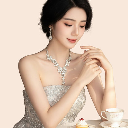 My Store 3-piece rhinestone necklace and earrings set with waterdrop and tassel details. Vintage court style.