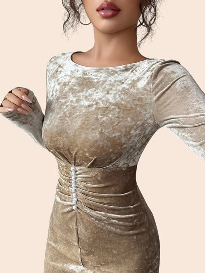 My Store velvet maxi dress with long sleeves, ruched waist detail, and pearl button accents in a champagne tone.