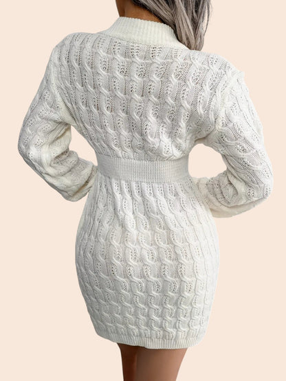 Back view of a My Store white cable-knit sweater dress featuring a cinched ribbed waist and voluminous sleeves.