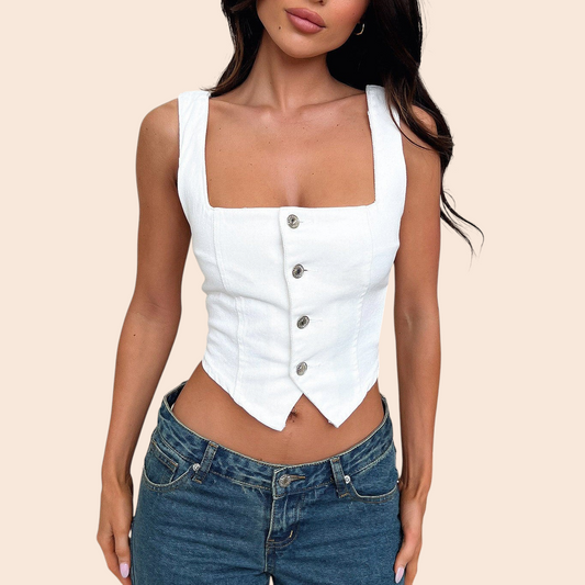 My Store white button-front corset vest top with a square neckline and pointed hem worn with blue denim jeans