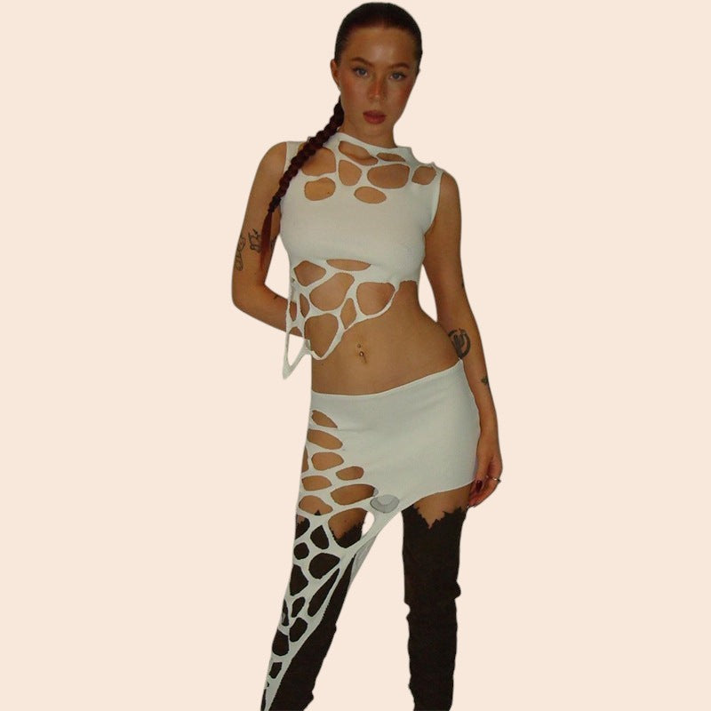 My Store white cotton sleeveless crop top and mini skirt with distressed cut-out details, worn by a model.